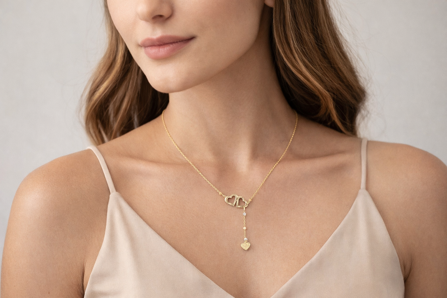 Cadena de Doble Corazón en Oro 14K con Caída